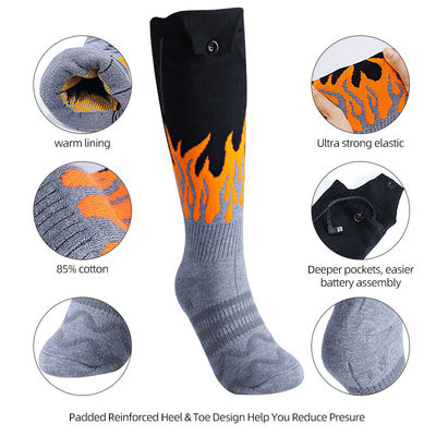 Il termale elettrico dell'inverno ha riscaldato i calzini lavabili con la batteria ricaricabile