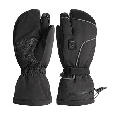 Le donne degli uomini anneriscono le fodere riscaldate termiche elettriche del guanto per corsa con gli sci e lo snowboard dell'inverno